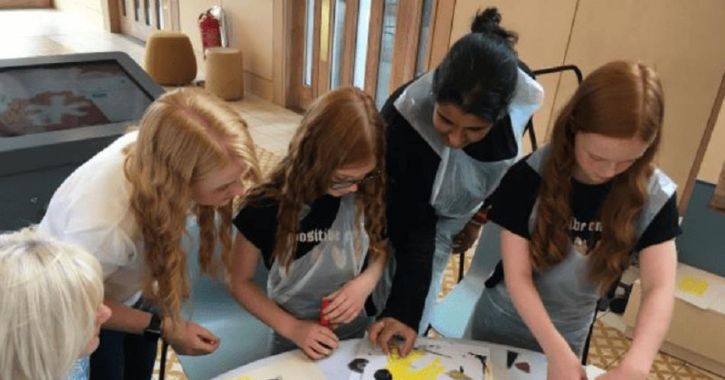 group of woman and girls enjoying Linocut Cards and Glass Bauble Painting at The Auckland Project.